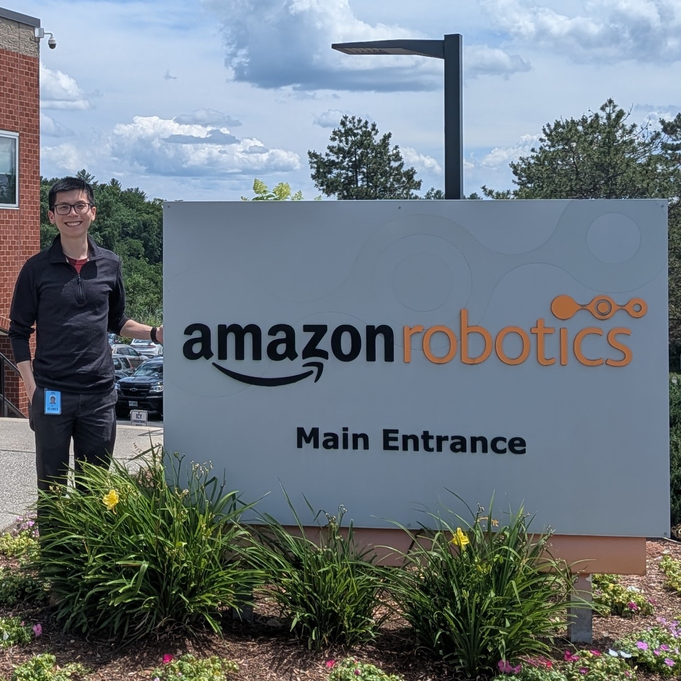 Posing in front the Amazon Robotics entrance in North Reading, MA